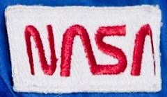 Red on white NASA worm logotype patch